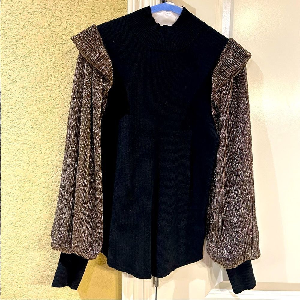 Entro size Medium black top with bronze/silver colored sleeves
